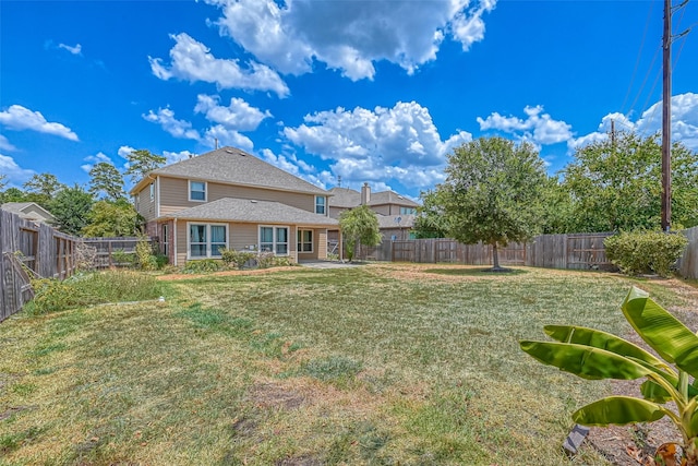 view of yard featuring a fenced backyard