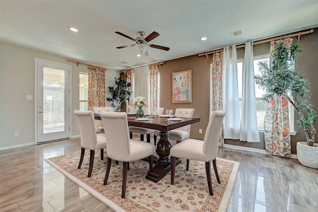 dining room with recessed lighting, visible vents, and baseboards