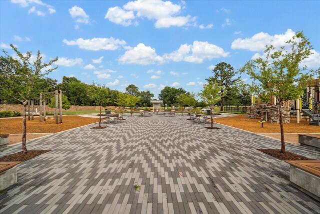 view of property's community featuring playground community