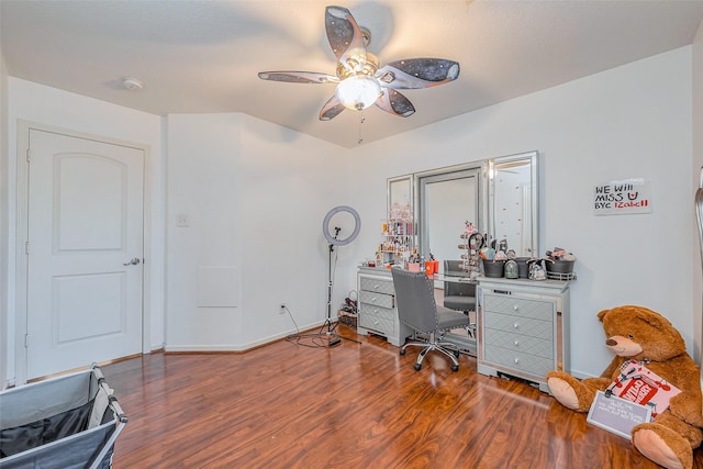 office area with ceiling fan, baseboards, and wood finished floors