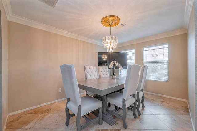 dining space with visible vents, an inviting chandelier, and crown molding