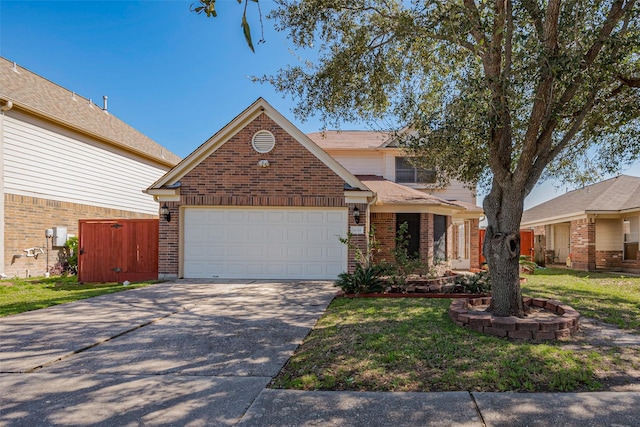 traditional-style home with brick siding, an attached garage, concrete driveway, and a front lawn