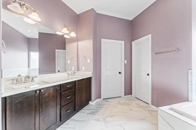 bathroom featuring a sink, marble finish floor, crown molding, and double vanity