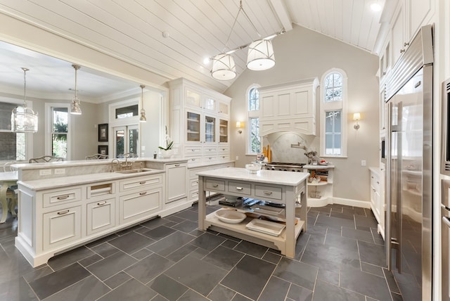 bathroom with ornamental molding, tasteful backsplash, wooden ceiling, baseboards, and vanity