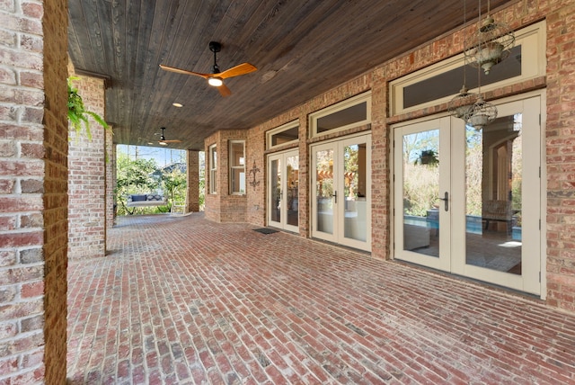 view of patio / terrace featuring french doors and a ceiling fan