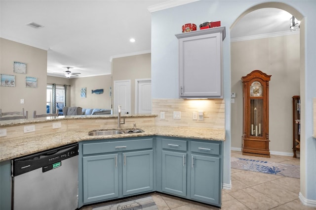 kitchen with visible vents, ornamental molding, a sink, stainless steel dishwasher, and decorative backsplash