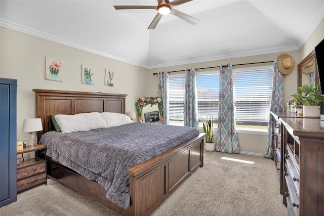 bedroom featuring light carpet, ceiling fan, crown molding, and vaulted ceiling