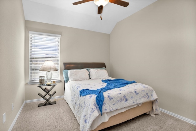 bedroom featuring vaulted ceiling, baseboards, carpet floors, and ceiling fan