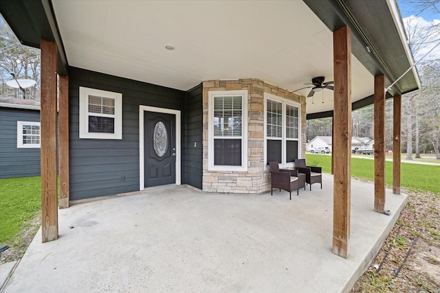 view of patio / terrace featuring ceiling fan