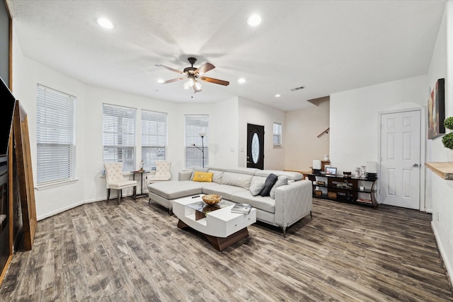 living area featuring recessed lighting, baseboards, a ceiling fan, and wood finished floors