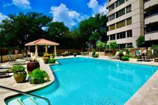 pool featuring a gazebo and a patio