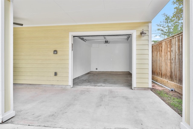 garage with fence