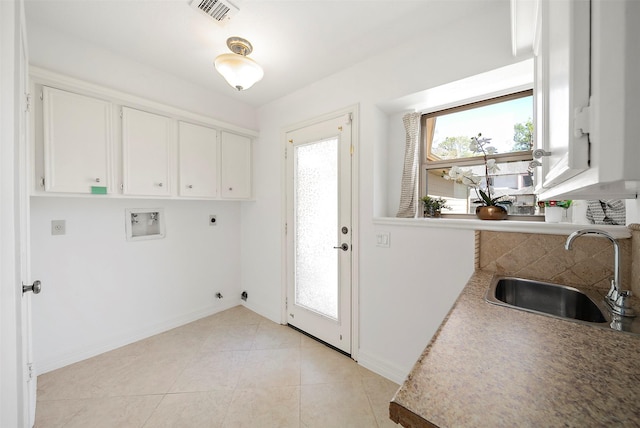 washroom featuring hookup for a washing machine, visible vents, hookup for an electric dryer, cabinet space, and a sink