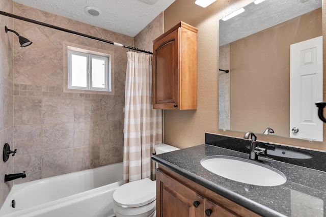 bathroom with vanity, toilet, shower / bathtub combination with curtain, and a textured ceiling