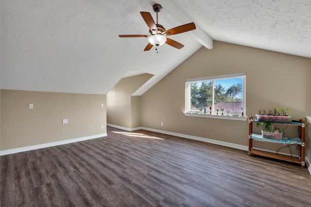 bonus room featuring a textured ceiling, wood finished floors, and vaulted ceiling with beams