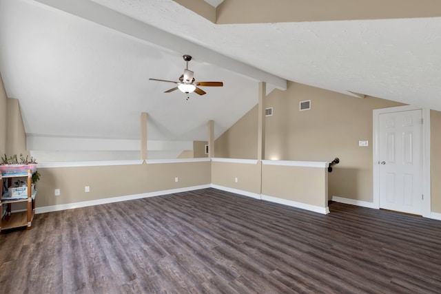 bonus room featuring vaulted ceiling with beams, wood finished floors, visible vents, and baseboards