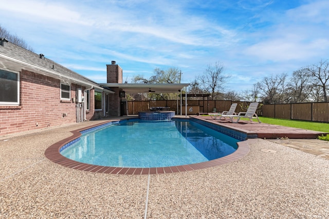 view of pool with a fenced in pool, a deck, and a fenced backyard