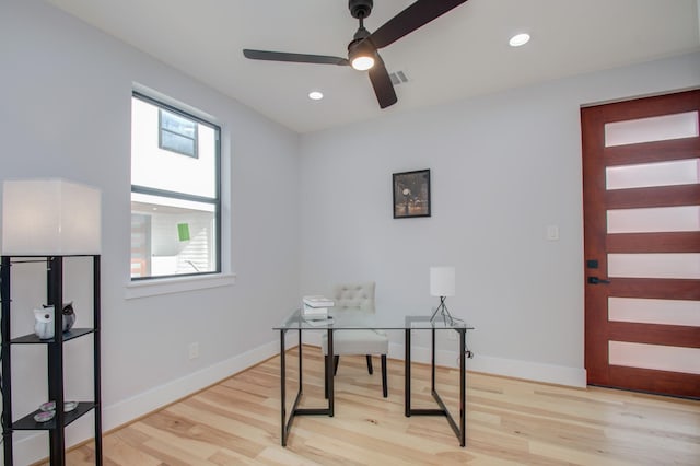 office space with light wood-type flooring, visible vents, plenty of natural light, and recessed lighting