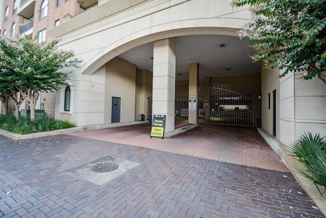 view of exterior entry with a gate