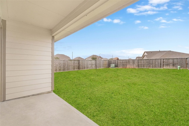 view of yard with a patio and a fenced backyard