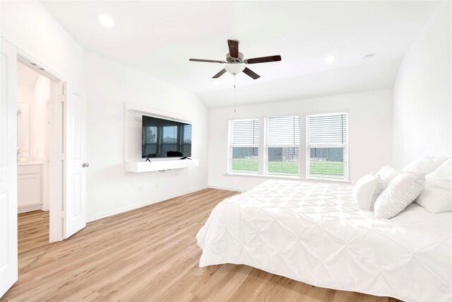 bedroom with baseboards, vaulted ceiling, recessed lighting, light wood-style flooring, and a ceiling fan