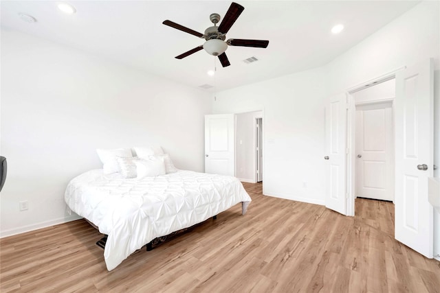 bedroom with visible vents, baseboards, ceiling fan, recessed lighting, and light wood-style flooring