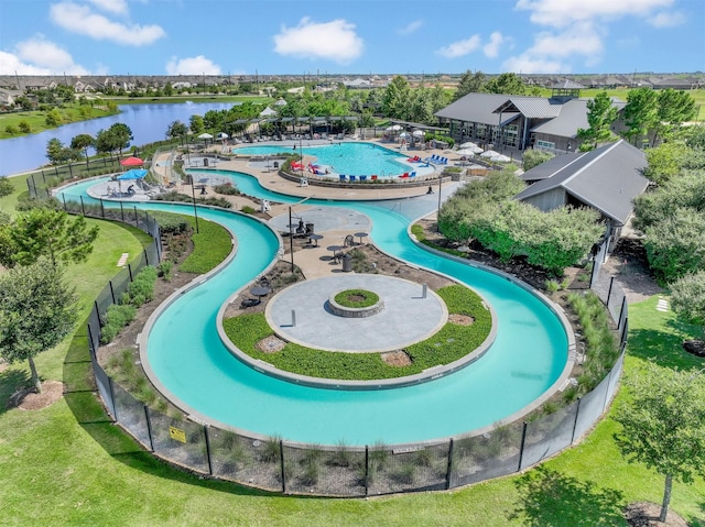 birds eye view of property featuring a water view