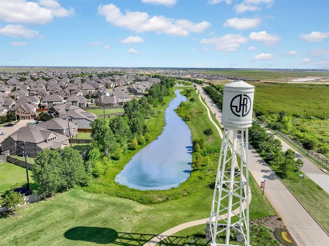 bird's eye view featuring a residential view and a water view