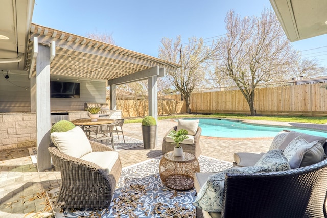 view of patio / terrace with a fenced in pool and a fenced backyard