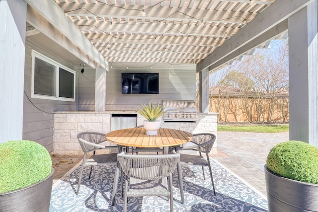 view of patio / terrace with fence, outdoor dining space, and a pergola