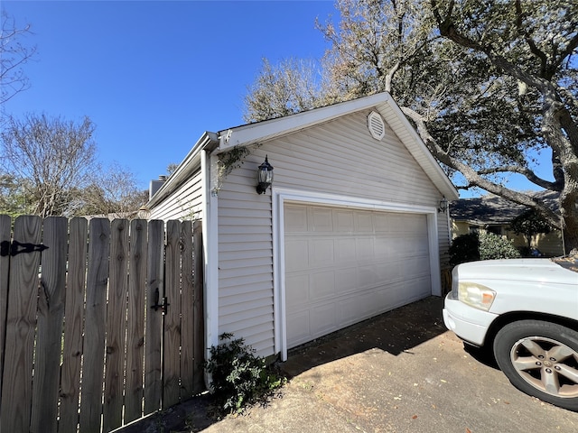 detached garage with fence