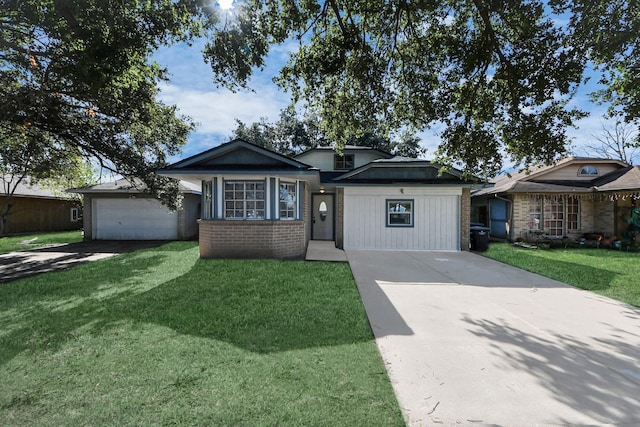 view of front of home featuring brick siding, an attached garage, concrete driveway, and a front yard