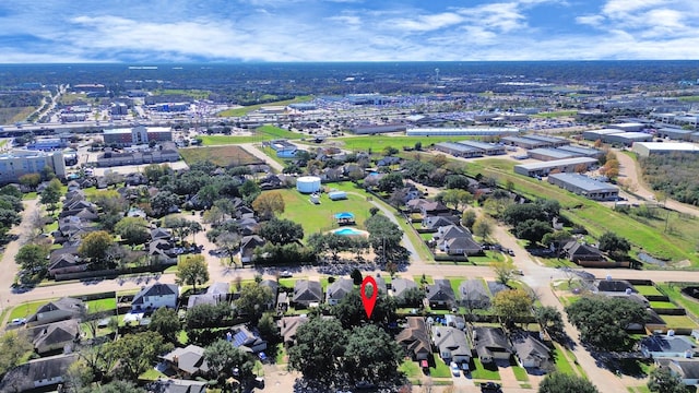 birds eye view of property with a residential view