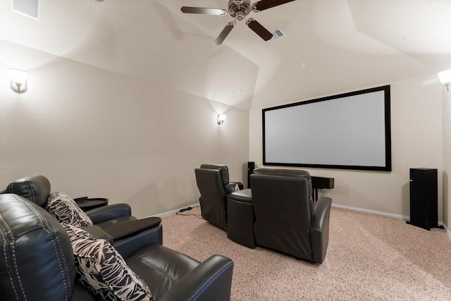 cinema with visible vents, carpet floors, baseboards, ceiling fan, and vaulted ceiling