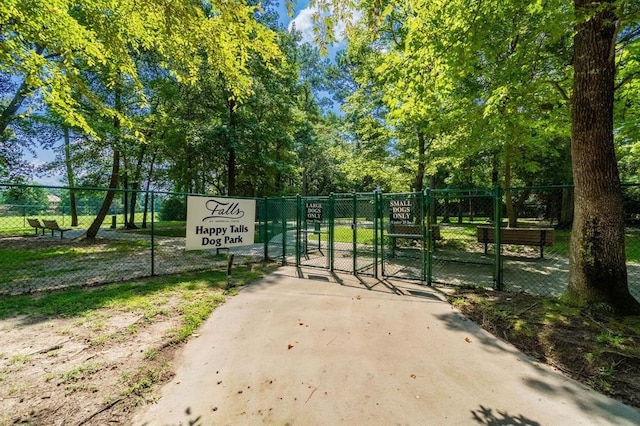 view of gate with fence