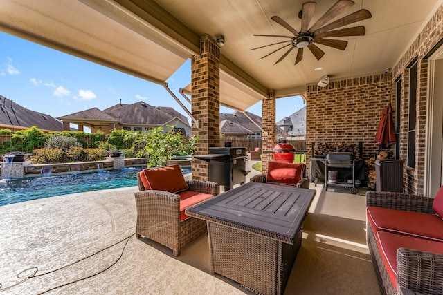 view of patio featuring a ceiling fan, fence, a fenced in pool, an outdoor living space, and grilling area