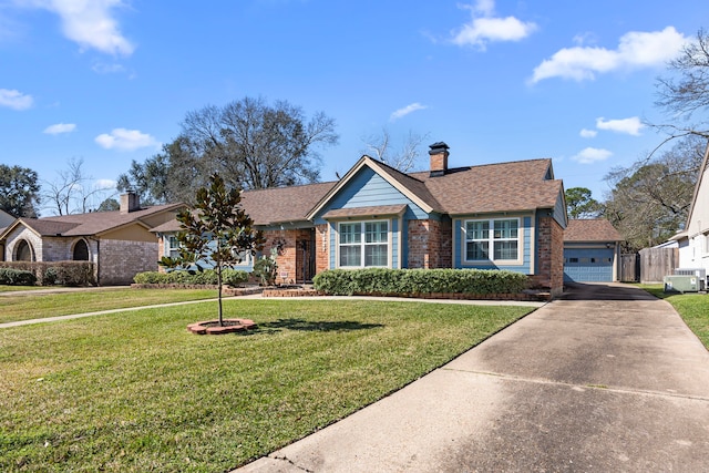 view of front facade with brick siding, a front lawn, fence, a garage, and driveway