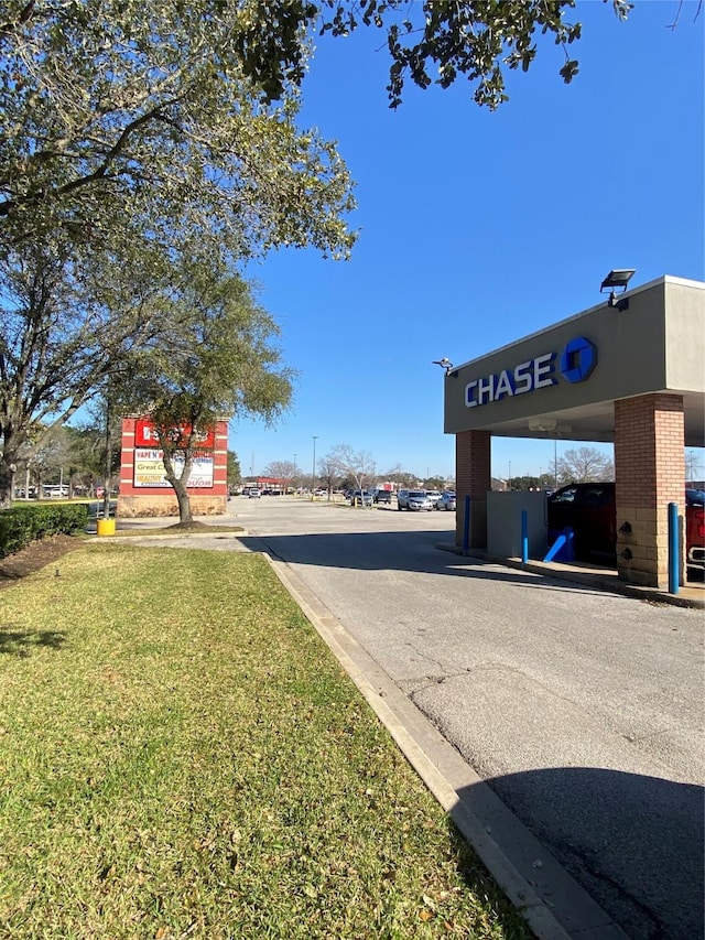 view of road featuring curbs