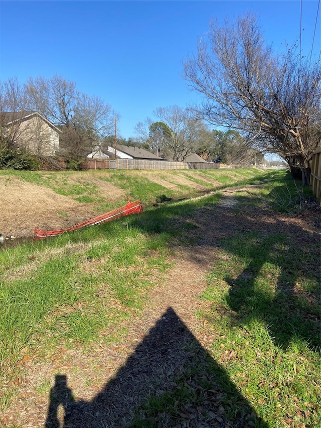 view of yard featuring fence