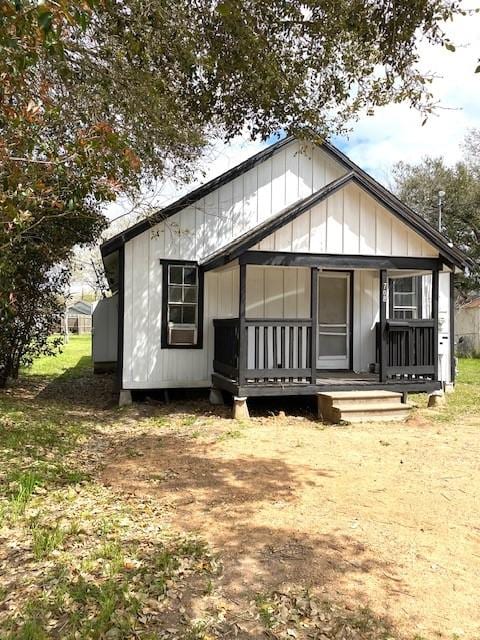 view of front of property featuring board and batten siding and covered porch