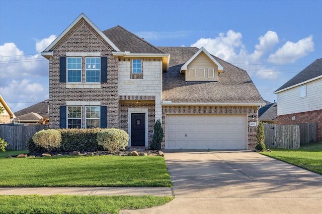 traditional home with brick siding, a garage, and fence