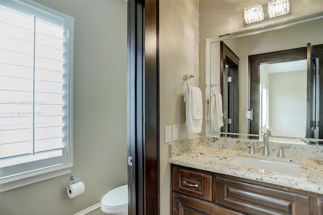 half bath with toilet and vanity