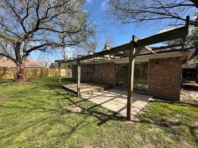 view of yard with a patio and fence