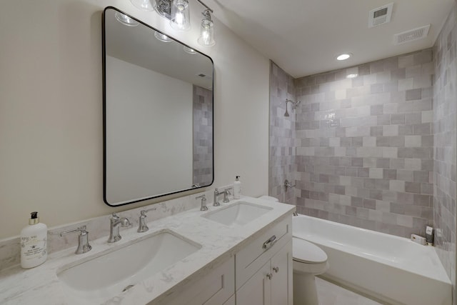 full bathroom featuring a sink, visible vents, and shower / bath combination