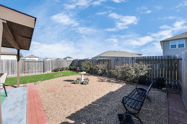 view of yard featuring a patio and a fenced backyard