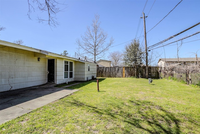 view of yard featuring a fenced backyard