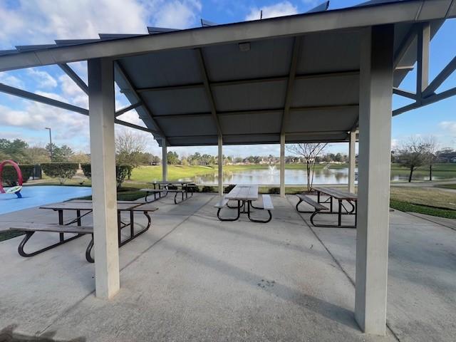 view of property's community with a patio