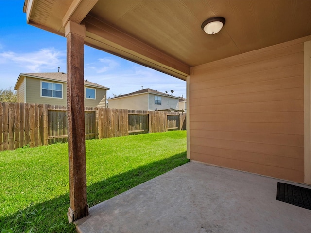 view of patio / terrace featuring a fenced backyard and visible vents