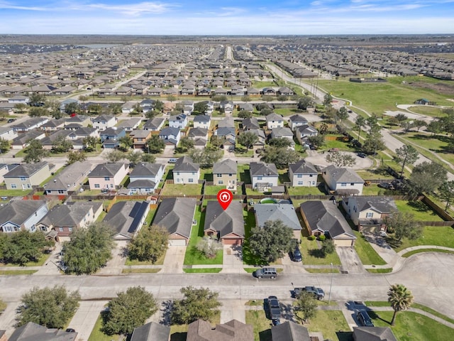 drone / aerial view with a residential view