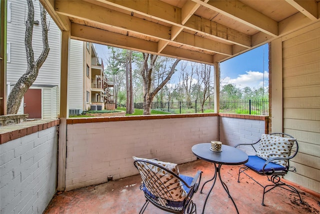 view of patio / terrace featuring fence